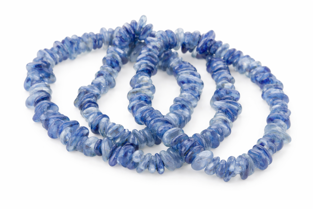 Two blue beaded kyanite bracelets on a white background