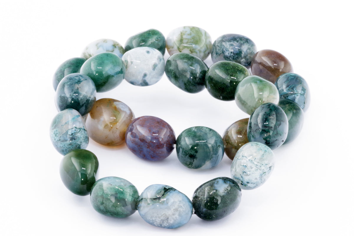 Close-up of a polished natural crystal bracelet featuring smooth, rounded moss agate stones in varying green, white, and brown shades, showcasing the Moss agate bracelet – Gem.