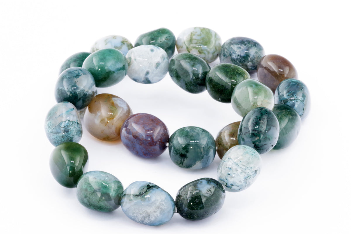 Moss agate bracelet – Gem featuring polished, multicolored natural crystals in shades of green, white, and brown, creating a unique crystal jewellery piece ideal for healing and meditation.