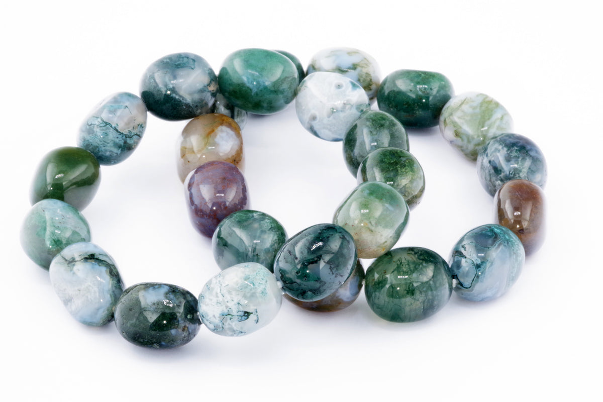 Moss agate bracelet – Gem featuring polished natural crystals in varying shades of green, white, and brown, ideal for crystal jewellery and healing crystal collections.
