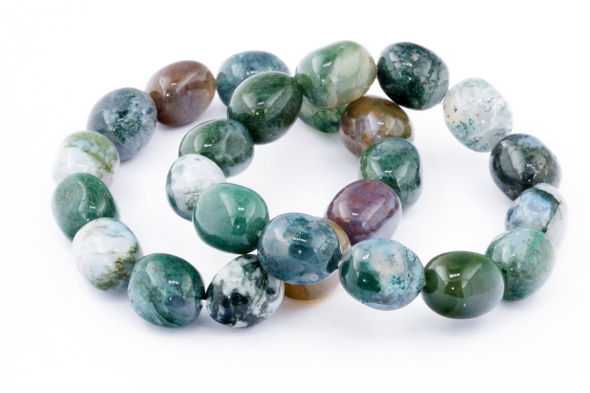 Moss agate bracelet – Gem featuring polished green and white natural crystals, showcasing unique earthy patterns in each bead for a grounding and calming crystal jewellery piece.
