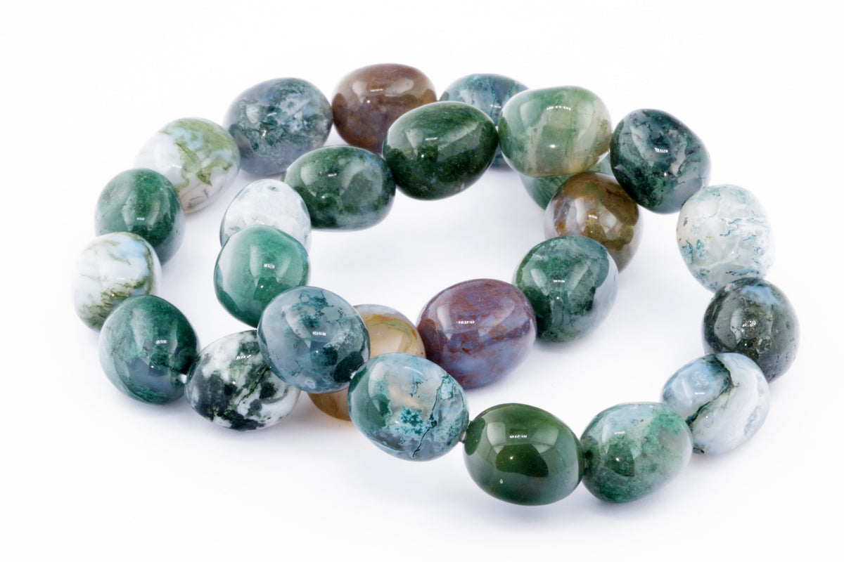 Moss agate bracelet – Gem featuring polished, rounded beads in varying shades of green, brown, and white, showcasing natural crystals in a stylish crystal jewellery piece.