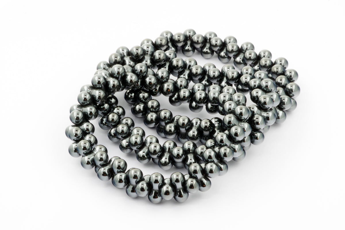 Hematite bracelet – DNA featuring polished metallic dark gray hematite beads arranged in a delicate linked design, perfect for crystal jewellery and healing crystals collections.