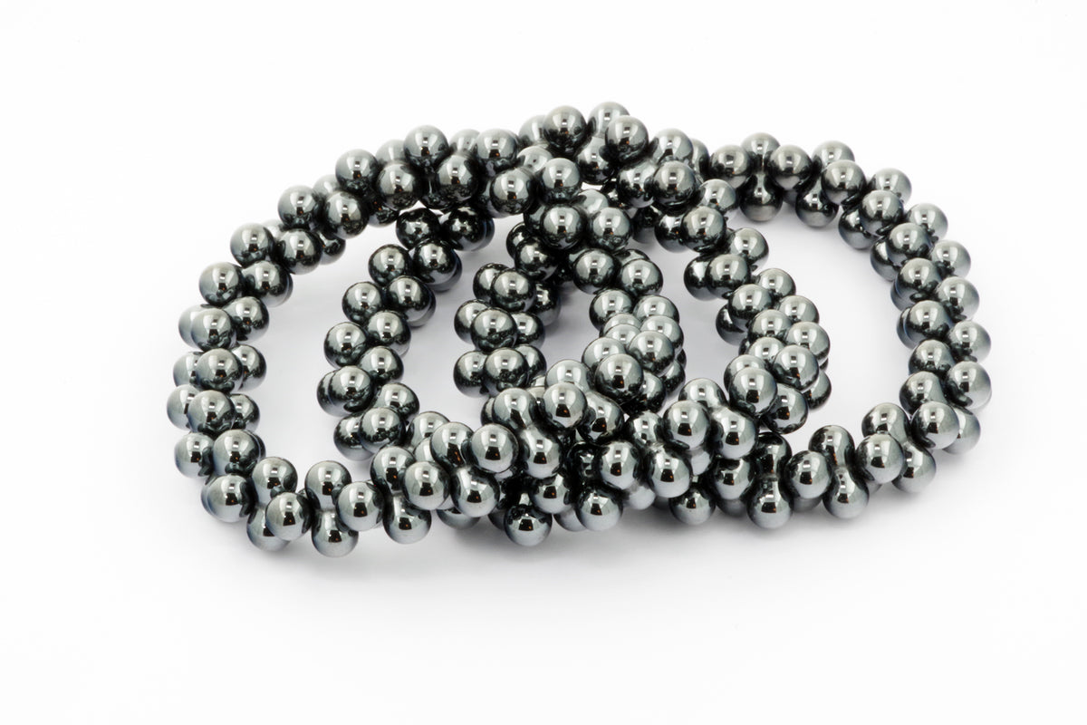 Hematite bracelet – DNA with polished natural hematite crystal beads arranged in a smooth, reflective finish, ideal for grounding and crystal jewelry enthusiasts.