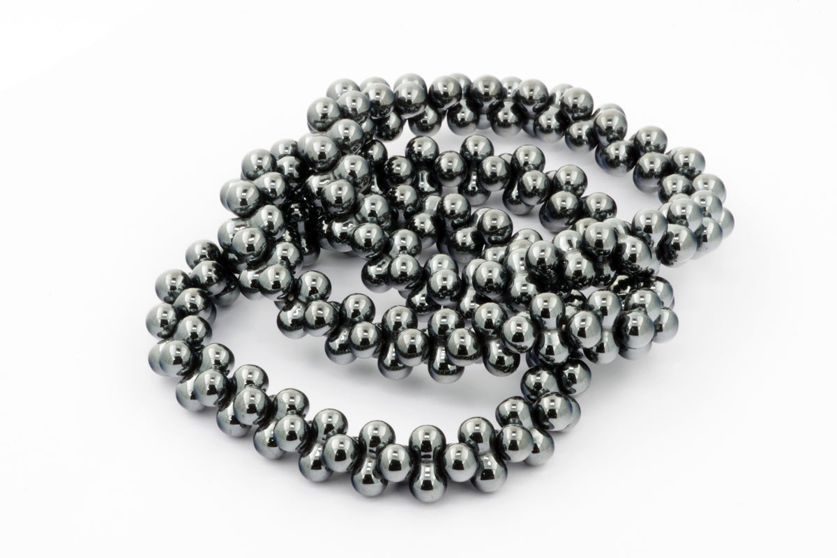 Hematite bracelet – DNA featuring polished hematite beads with a smooth, reflective surface, ideal as a healing crystal bracelet for grounding and balance.