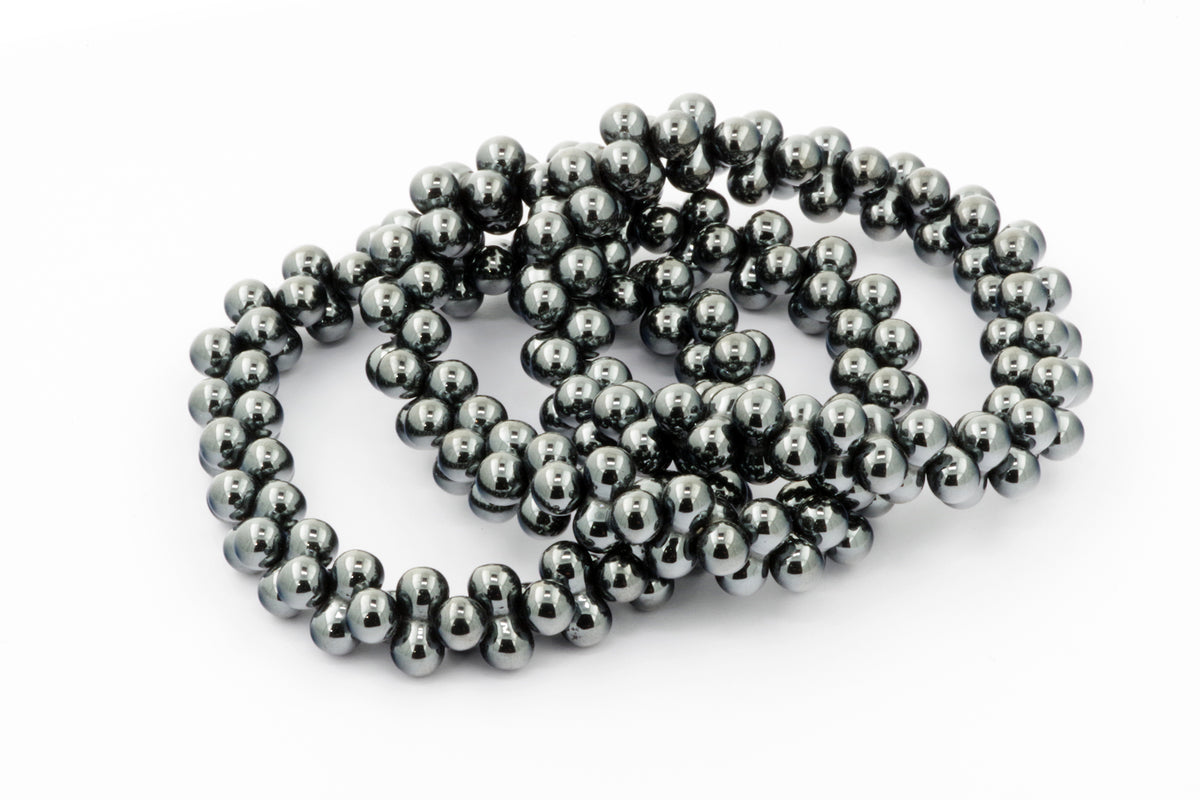 Hematite bracelet – DNA featuring polished dark metallic hematite beads arranged in a stylish, linked design ideal for crystal jewellery and healing crystal collections.