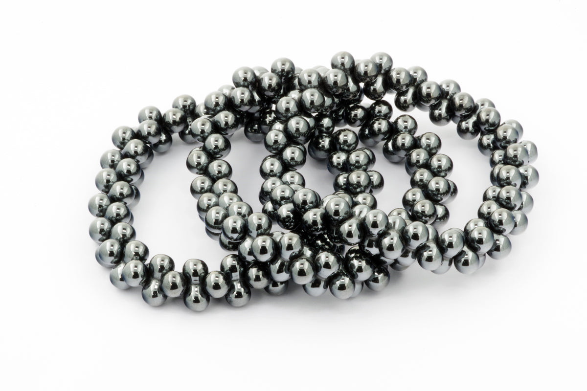 Hematite bracelet – DNA made of polished natural hematite crystal beads, showcasing a smooth metallic finish ideal for crystal jewellery and grounding energy.
