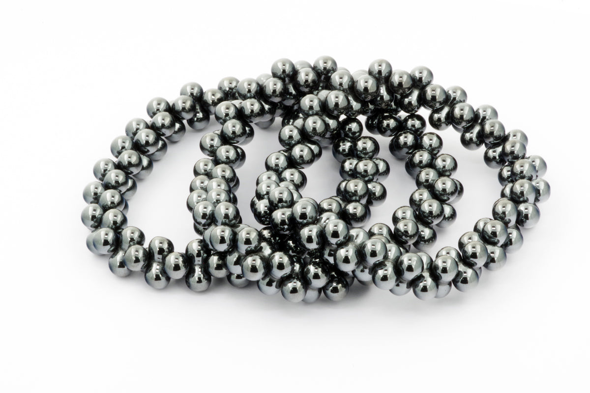Hematite bracelet – DNA featuring polished hematite gemstone beads arranged in a spherical design, ideal for grounding and crystal healing jewelry collections.