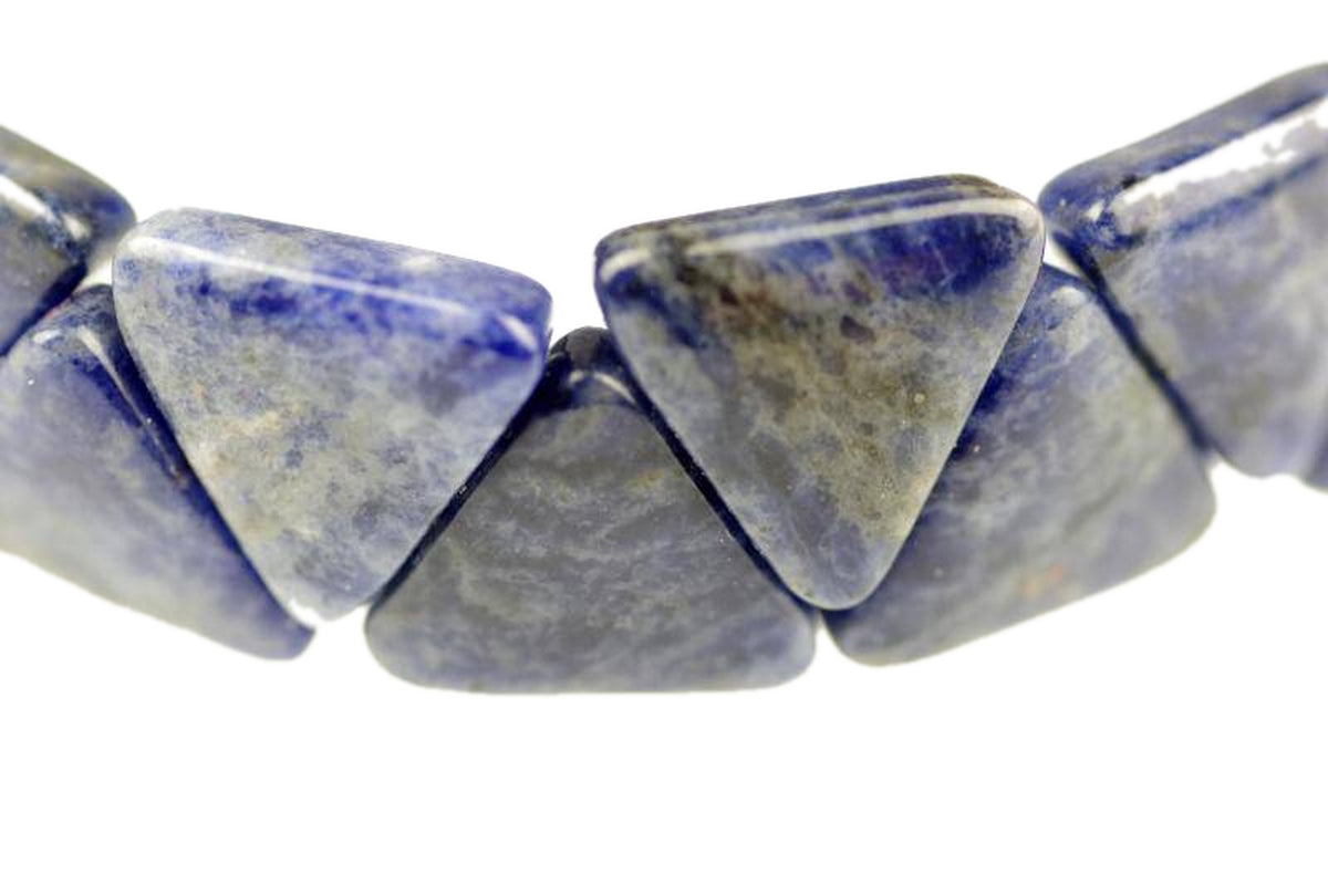 Close-up of polished triangular blue sodalite stones arranged to form a Sodalite bracelet – Triangle, showcasing natural crystal patterns and gemstone texture.