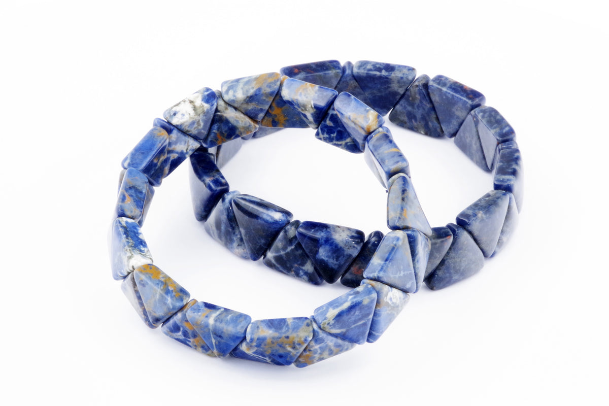 Two Sodalite bracelet – Triangle pieces featuring polished blue and white natural crystal gemstones arranged in triangle shapes on a white background, ideal as healing crystal jewellery.