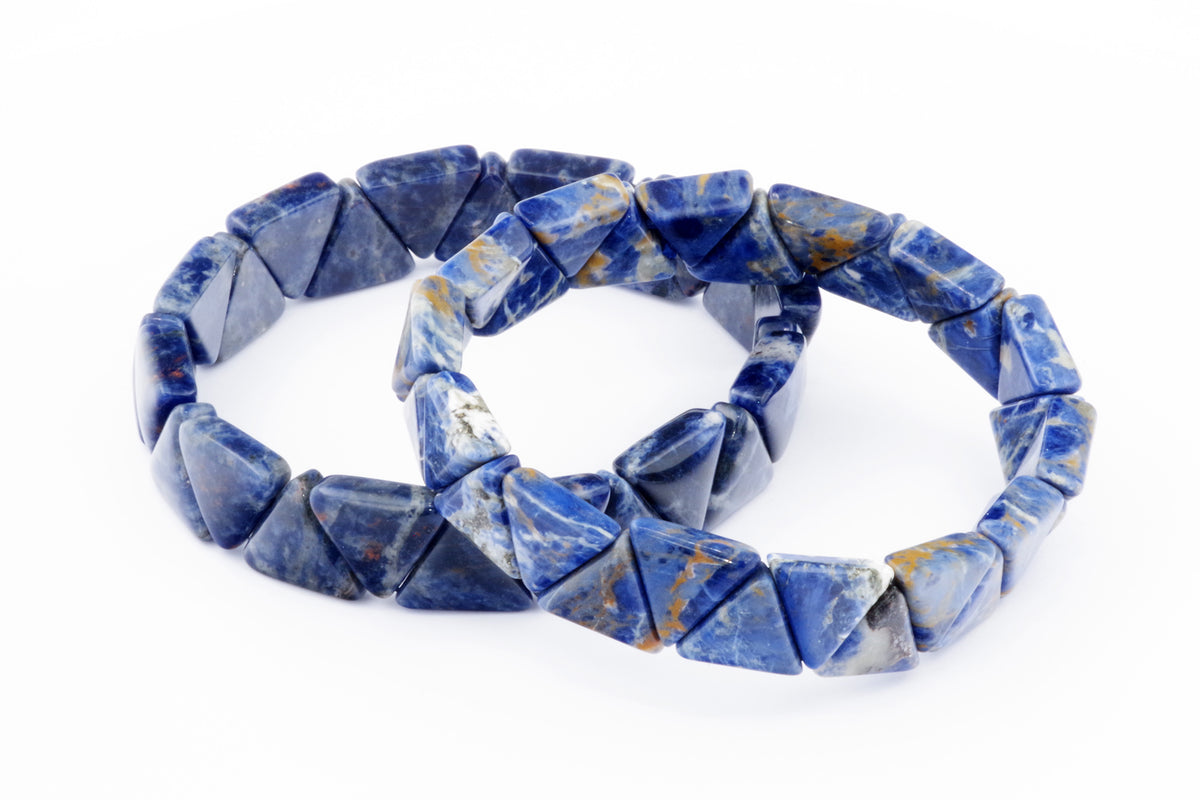 Two Sodalite bracelet – Triangle pieces made of polished blue gemstone triangles with white and golden veins, designed as crystal jewellery for healing and meditation.