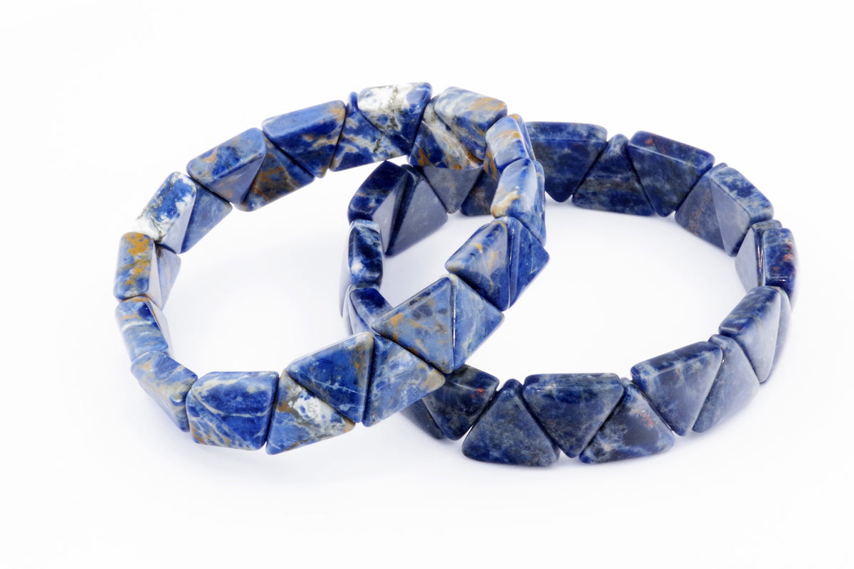 Two sodalite bracelets – Triangle featuring polished blue and white natural crystals arranged in triangular shapes, perfect as crystal jewellery for healing and energy.