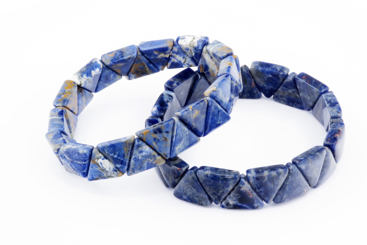 Two Sodalite bracelet – Triangle pieces featuring deep blue natural crystals with white and gray mineral patterns, showcasing polished triangular gemstone beads.