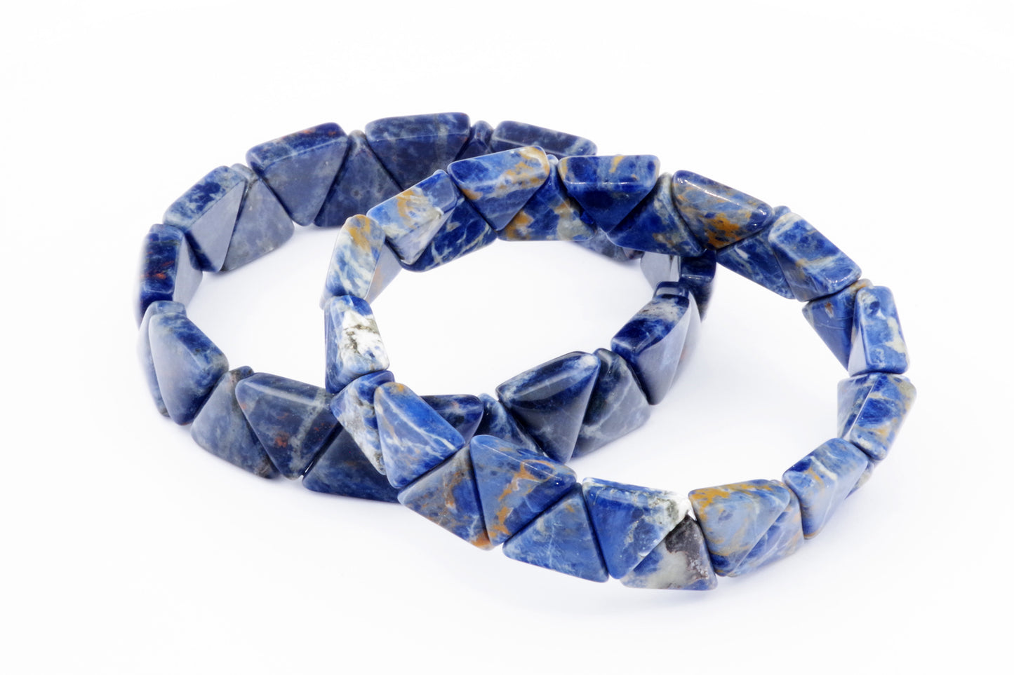 Two sodalite gemstone bracelets featuring triangular-shaped polished crystals arranged in a continuous loop, known as Sodalite bracelet – Triangle, on a white background.