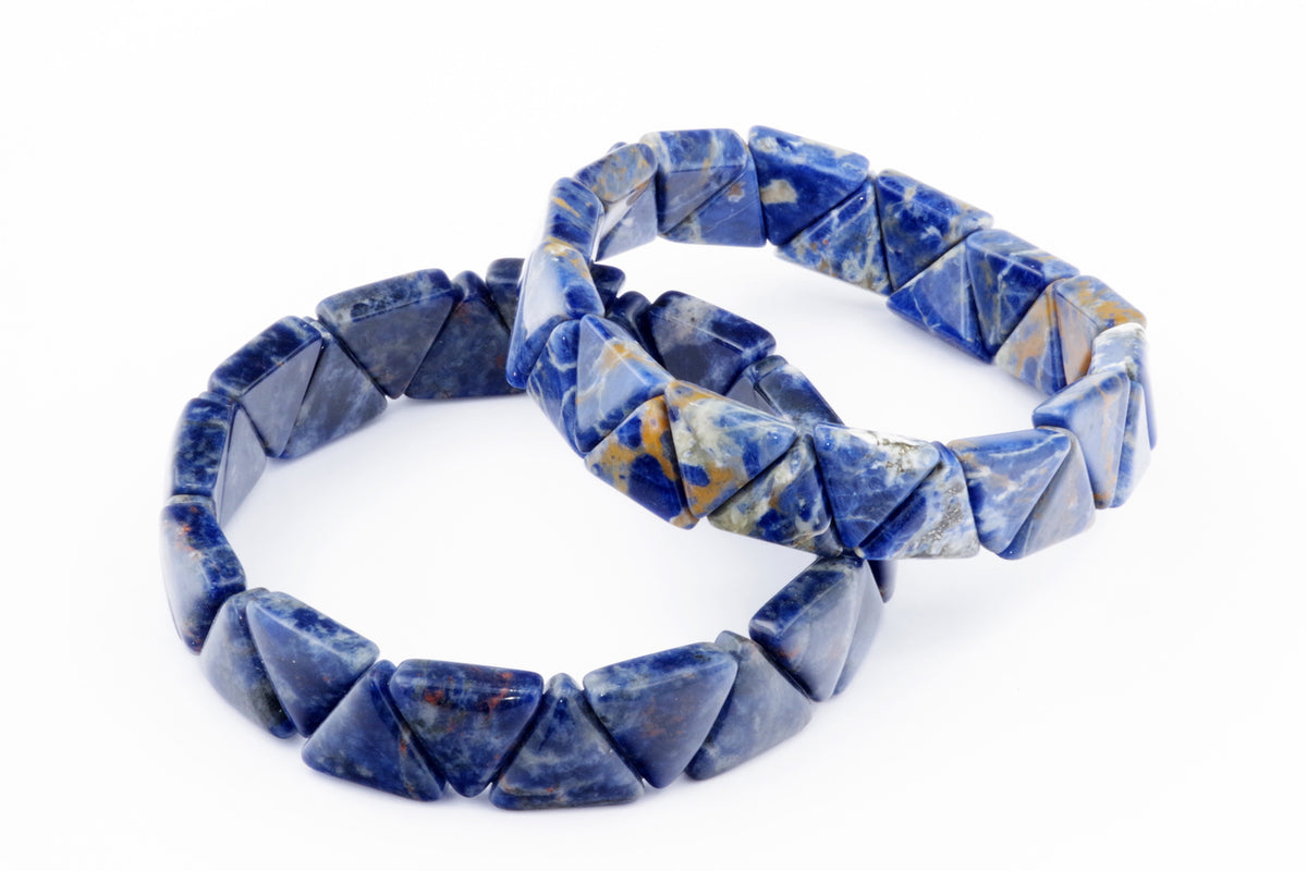 Two Sodalite bracelet – Triangle pieces featuring polished blue natural crystal gemstones shaped into triangular beads, highlighting mineral patterns and textures.