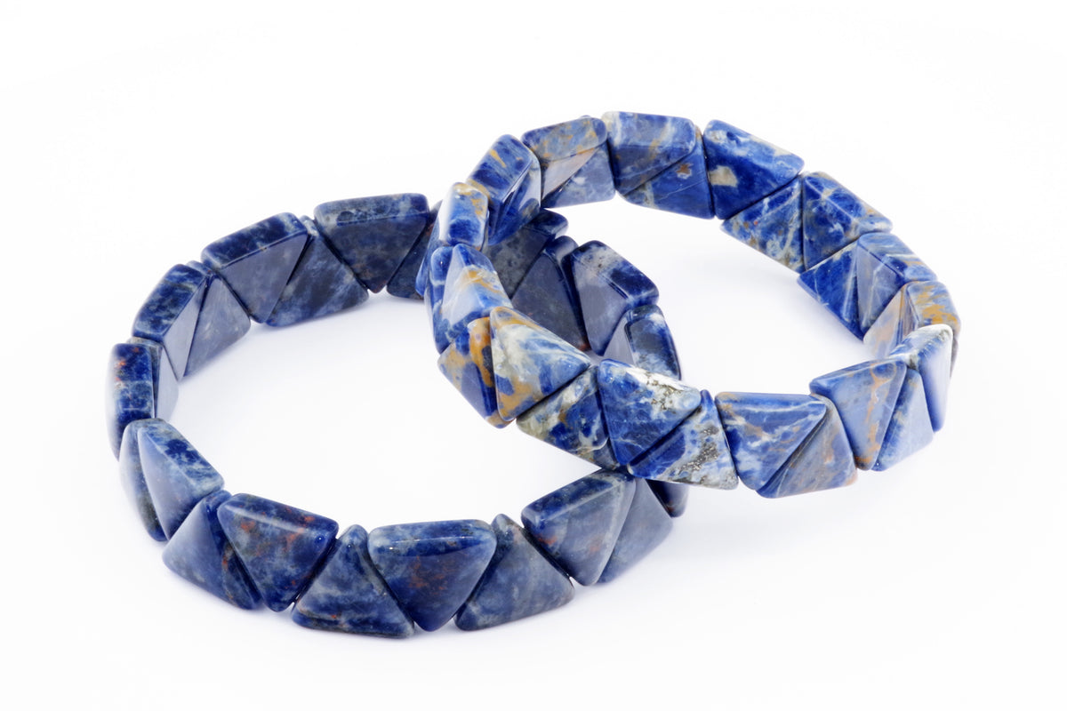 Two Sodalite bracelet – Triangle pieces featuring polished deep blue natural crystals with white and brown mineral patterns, perfect as healing crystal jewellery.