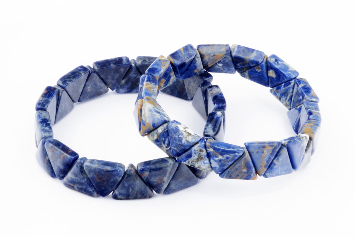 Two Sodalite bracelet – Triangle crystal bracelets featuring polished blue natural gemstones with white and brown mineral patterns on a white background.