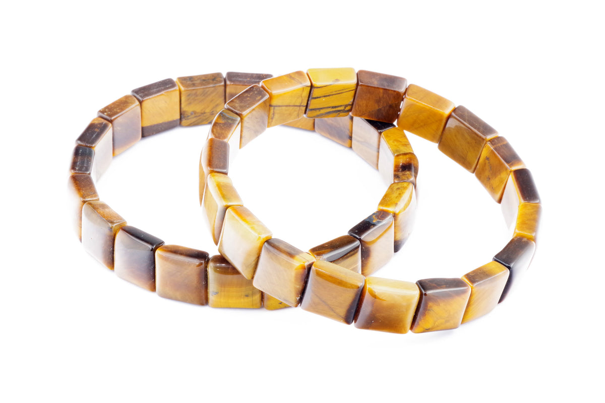 Three polished natural tiger's eye crystal bracelets with square-shaped beads, showcasing golden brown and honey tones, Tiger eye bracelet – Square, perfect for healing and grounding.