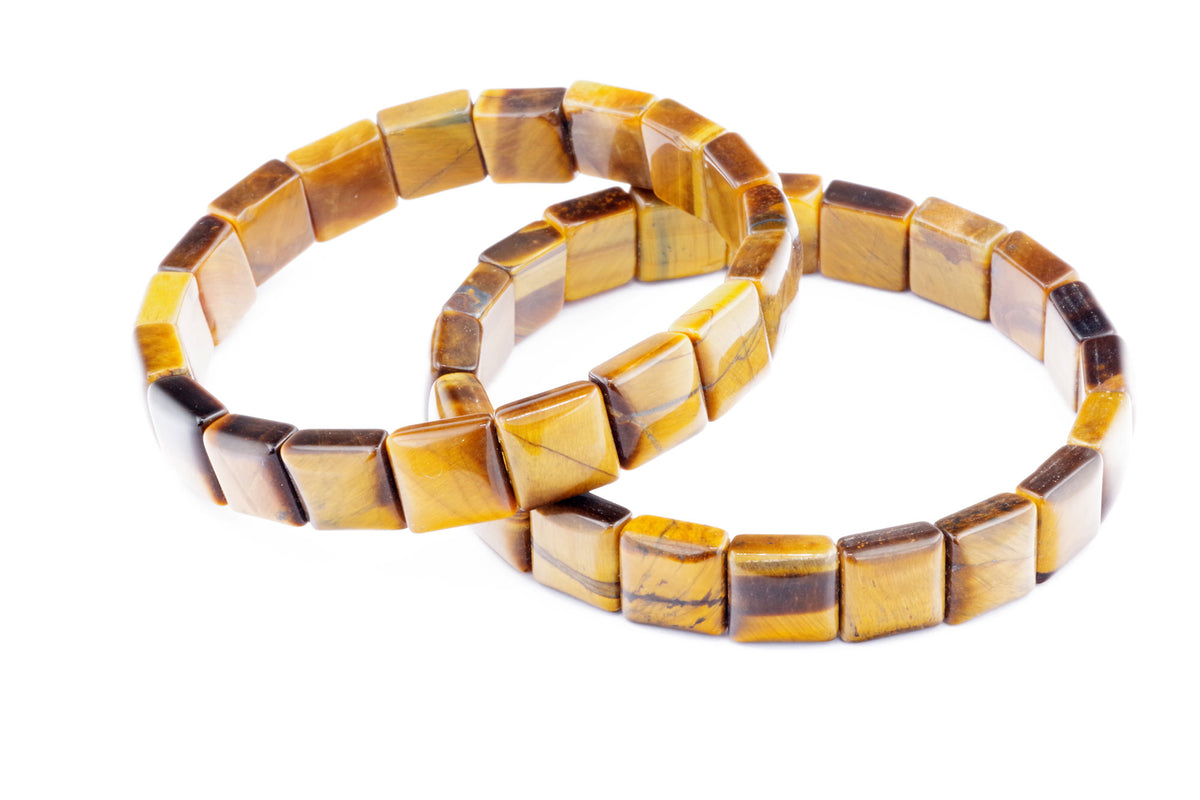 Two Tiger eye bracelet – Square pieces made of polished natural crystals with rich golden and brown hues, arranged in a sleek geometric design.