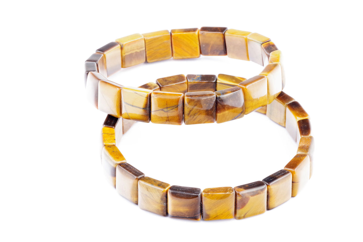 Two polished Tiger eye bracelet – Square pieces featuring natural brown and golden gemstone crystals arranged in square shapes on an elastic strand for a stylish look.