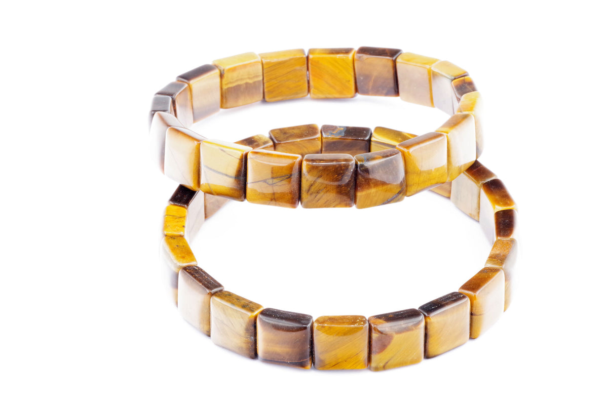 Two Tiger eye bracelet – Square strands made of polished natural tiger's eye gemstone beads in warm golden and brown hues on a white background