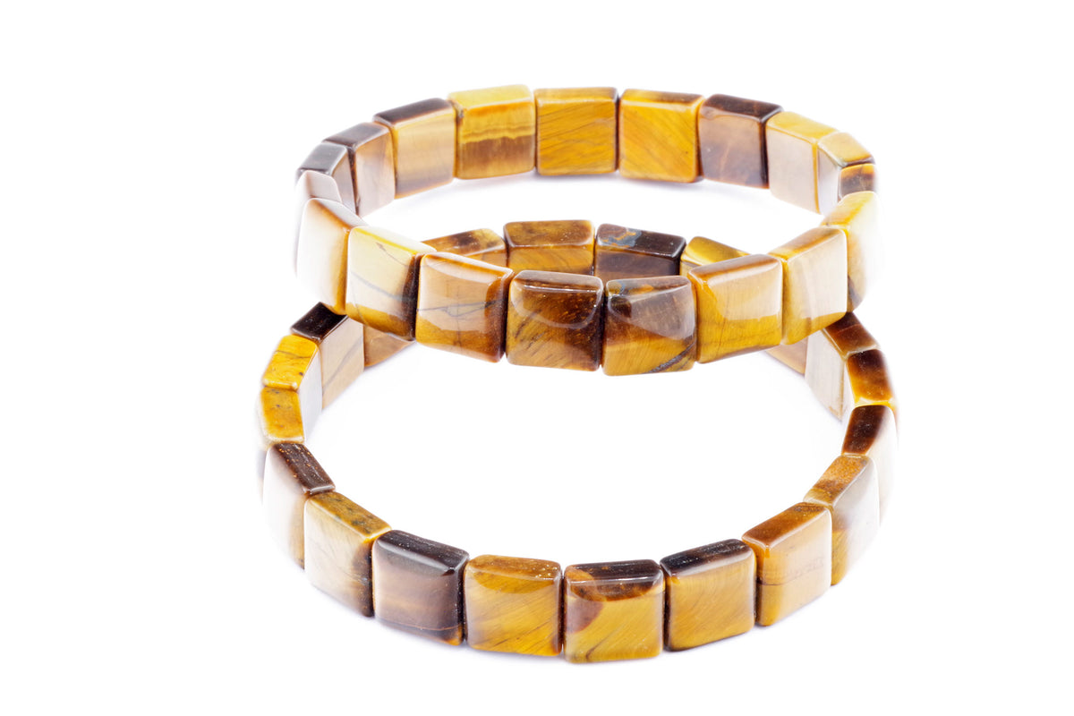 Two Tiger eye bracelet – Square designs made of polished natural tiger's eye gemstones in warm brown and golden tones, reflecting light on a white background.