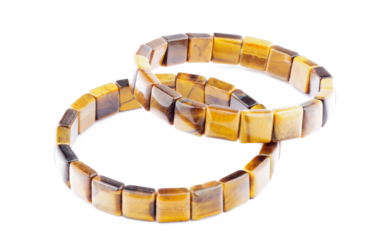 Two polished Tiger eye bracelets – Square with natural golden and brown gemstone beads arranged on a white background.