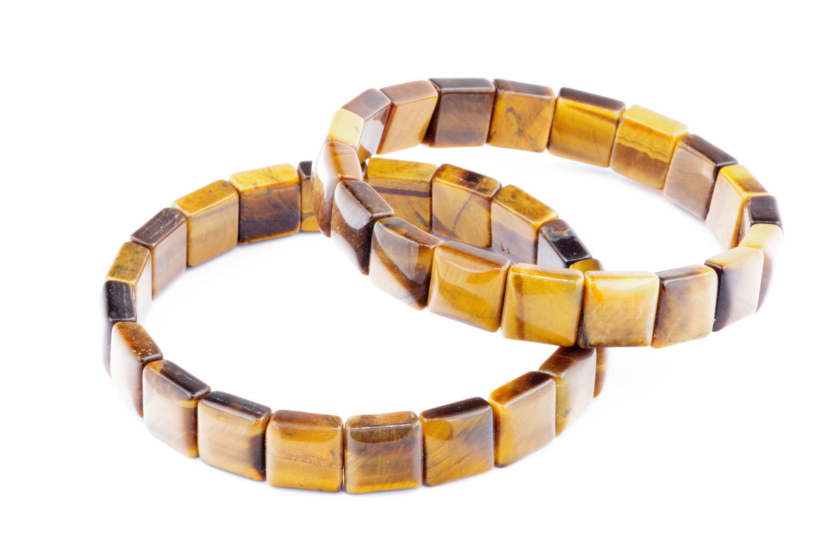 Two polished tiger's eye square bead bracelets showcasing natural golden-brown hues and chatoyancy, styled as crystal bracelets ideal for healing and grounding energy, named Tiger eye bracelet – Square.