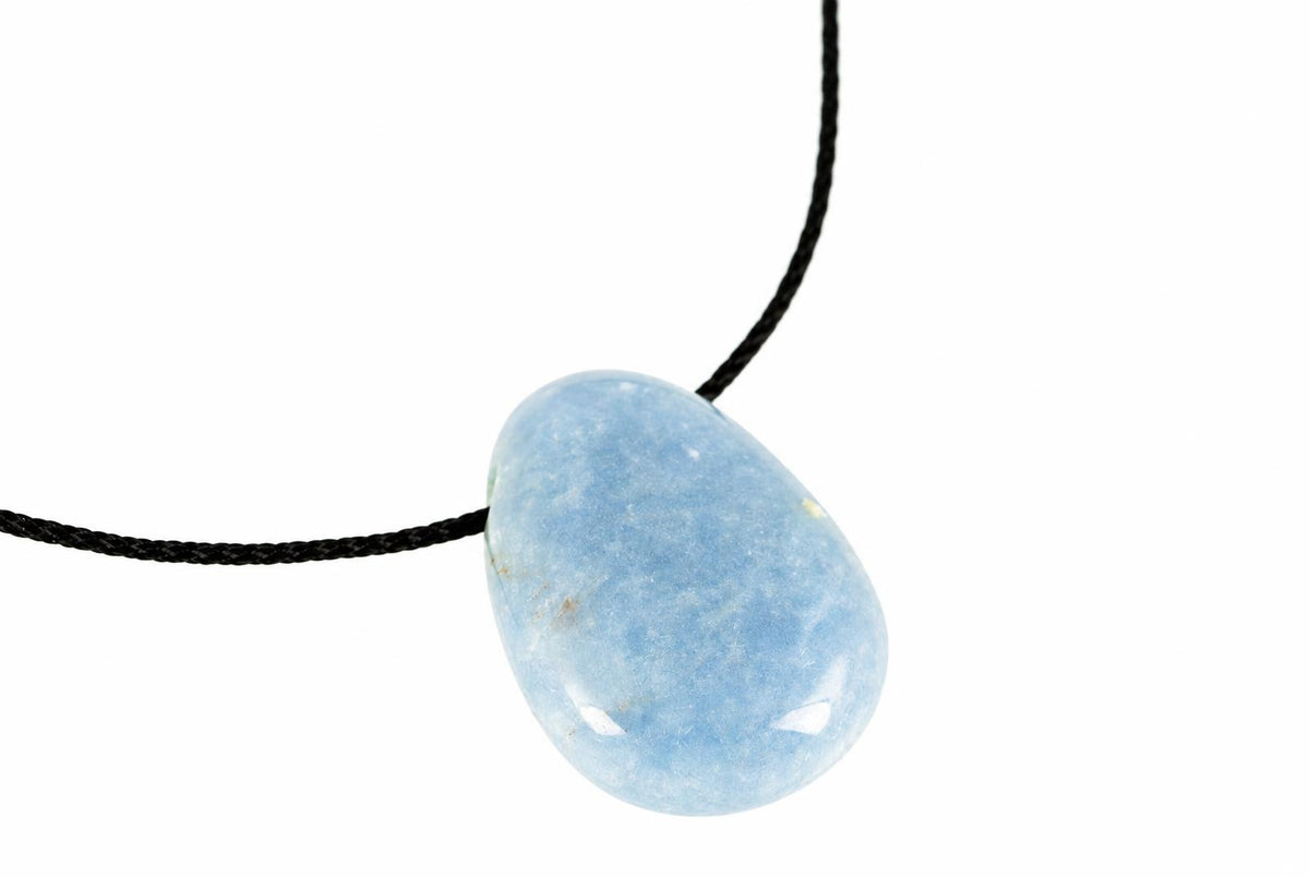 A smooth, light blue pendant with a teardrop shape hangs from a black cord against a white background.