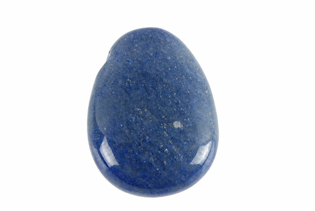 A polished, dark blue stone with white flecks, shaped like a smooth drop on a pale surface.