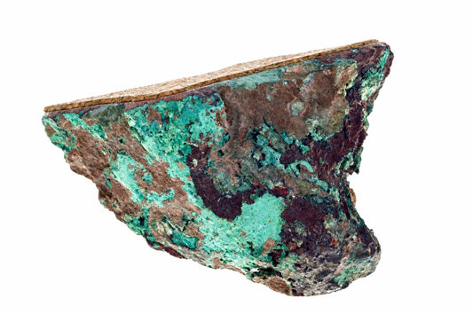 A rough, irregular piece of copper with green and brown patina on a white background.