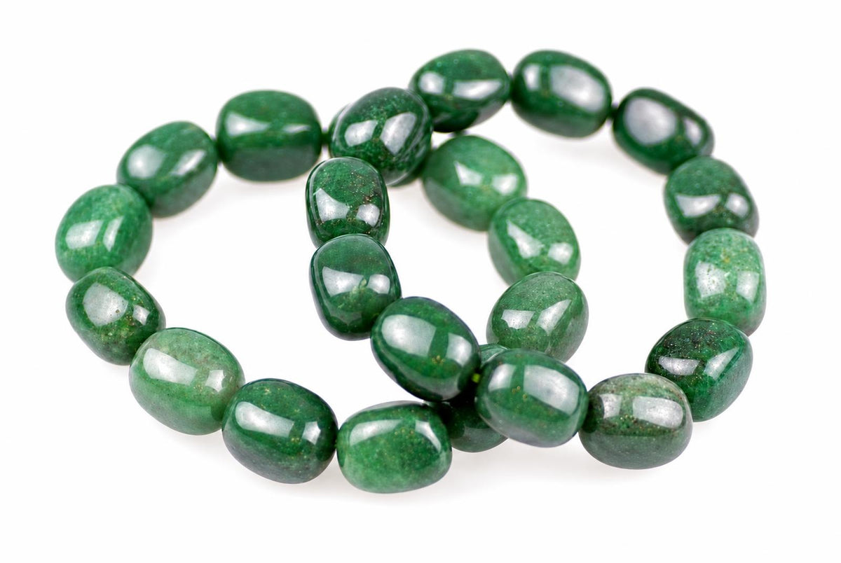Overlapping loops of glossy, rounded green beads with varied pale and dark mottling, viewed at an angle on a white background.