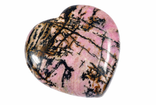 A polished heart-shaped stone with pink, brown and black patterns on a white background.
