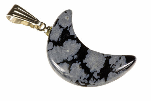 A crescent-shaped pendant with a polished dark surface featuring light grey and black patterns, attached to a silver-toned metal bail on a white background.