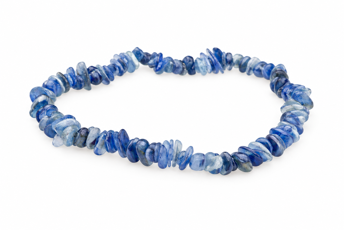 A bracelet made of irregular blue and white chips on a pale surface.