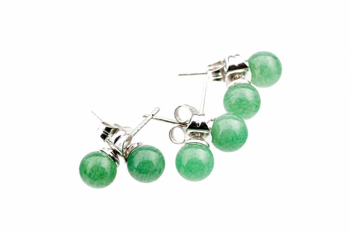 A pair of stud earrings with round green aventurine beads and silver-toned posts on a white background.