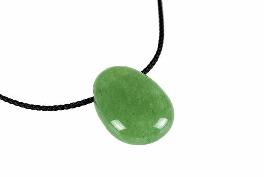 A smooth, oval green pendant on a black cord against a white background.