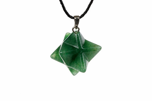 A green Aventurine pendant carved into a star shape, hanging from a black cord against a white background.