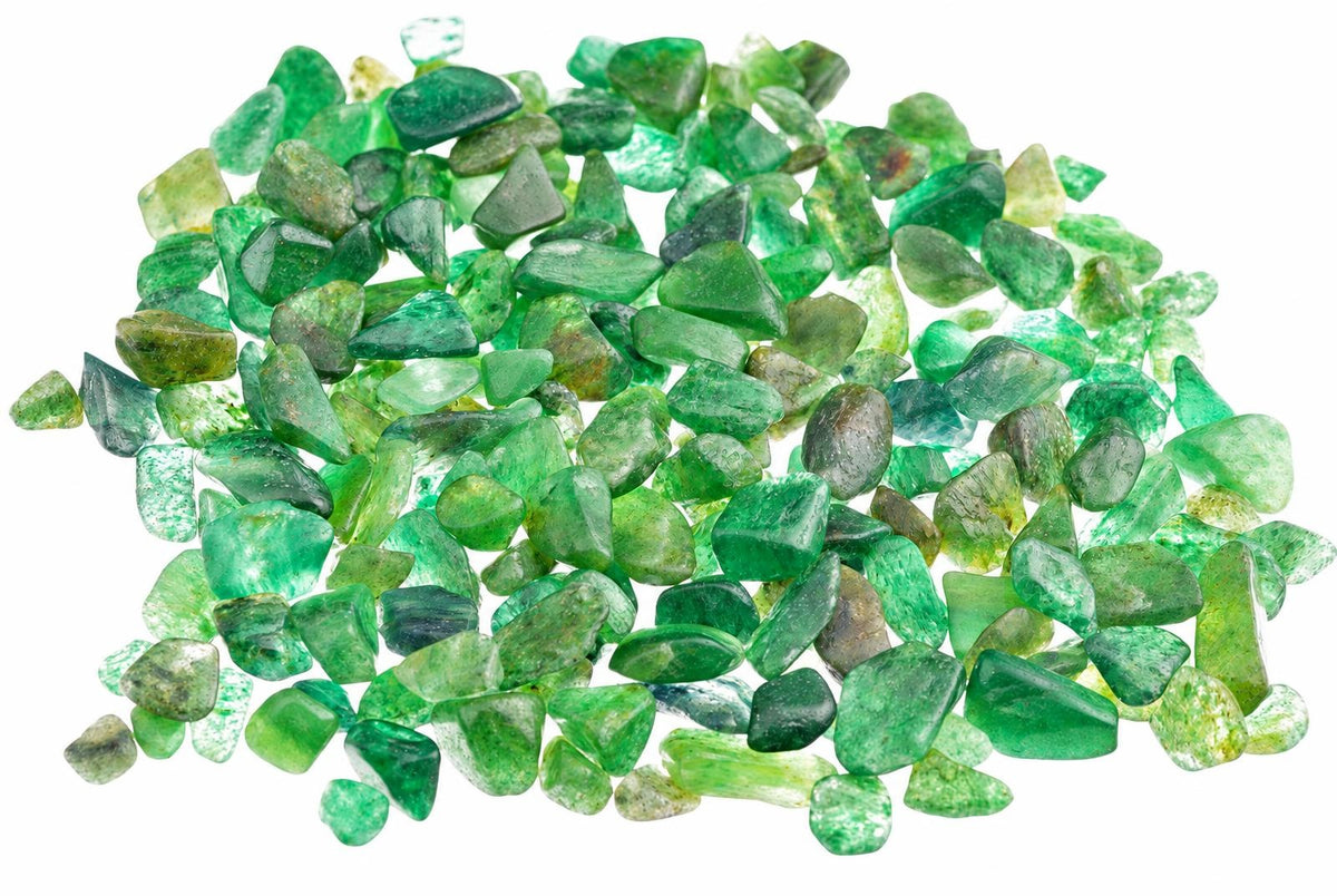 A pile of small, irregular green aventurine stones on a white background.