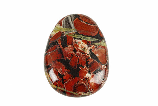 A polished, oval-shaped stone pendant with a brecciated pattern of red, black, white, and green fragments on a white background.