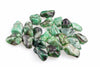 A pile of polished green and dark inclusions stones on a white surface.