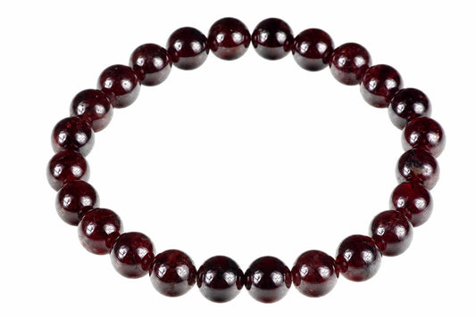 A bracelet made of round, polished dark red beads arranged in a circle on a white background.