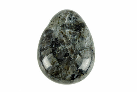 A gray granite drop pendant shows mottled black and pale patches beneath a polished surface, suspended from a black cord on white.