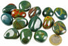 A collection of polished Heliotrope stones with green, red and yellow patterns on a white surface next to a one euro coin.