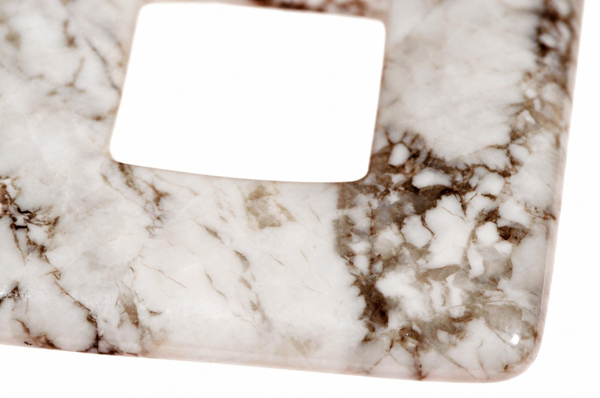 A close-up of a square pendant with rounded corners, featuring a white and brown marbled pattern resembling howlite.