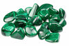 A pile of polished malachite stones with green and white banding on a white background.
