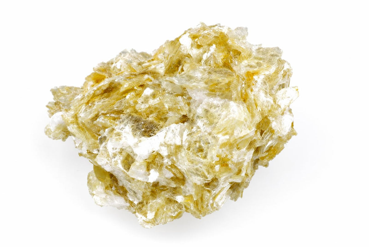 A cluster of translucent, golden-yellow and white muscovite crystals on a plain white surface.