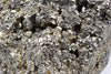 A close-up view of a rough, metallic mineral specimen with silver-toned crystals and dark grey surfaces.