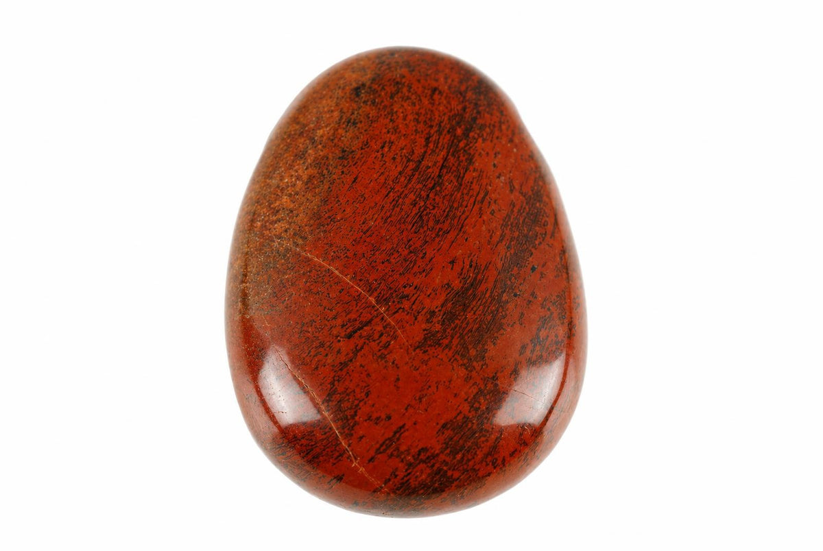 A polished, oval-shaped stone with a deep red base and dark brown speckles on a white background.