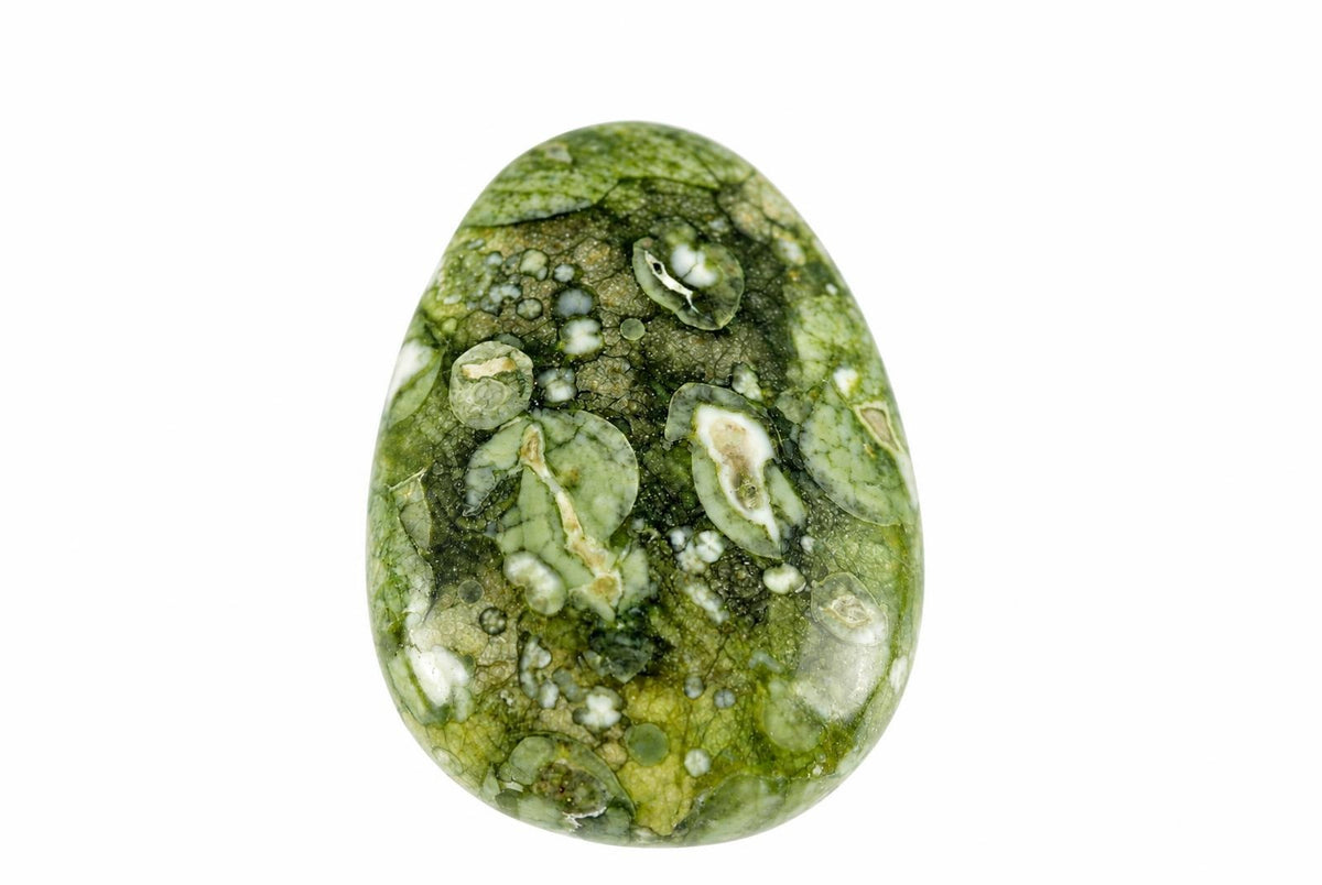 A polished, oval-shaped stone pendant with green and white patterns on a plain background.